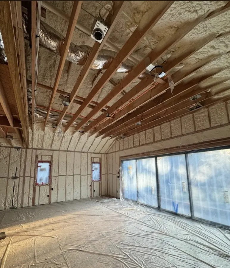 Interior walls and ceiling insulated with spray foam during new construction in Ocean Pines